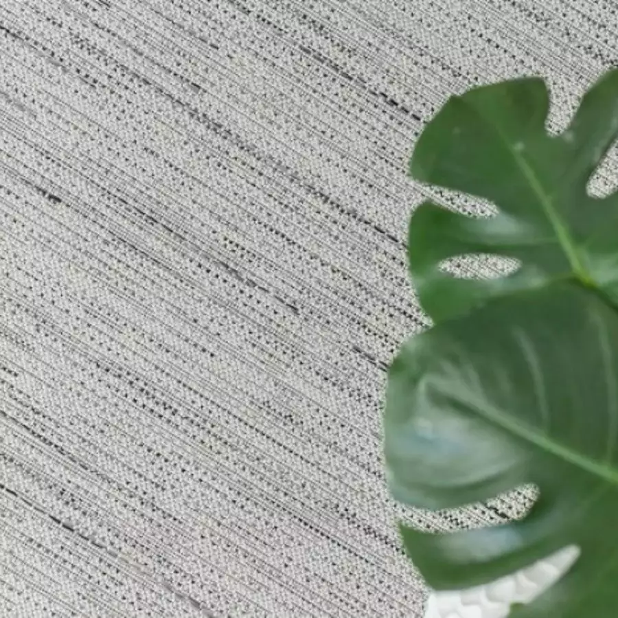 Carnival 6’7' x 9’ Indoor/Outdoor Ivory Sand Textured Rug